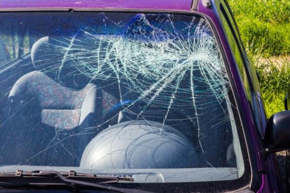 broken car windshield after a crash